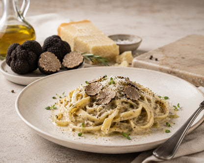 Fresh Summer Black Truffle shaved on pasta for chefs restaurants and foods lovers